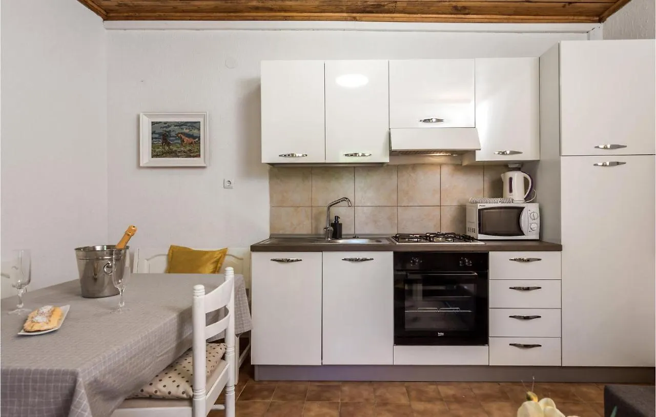 Stunning Apartment In Mundanije With Kitchen